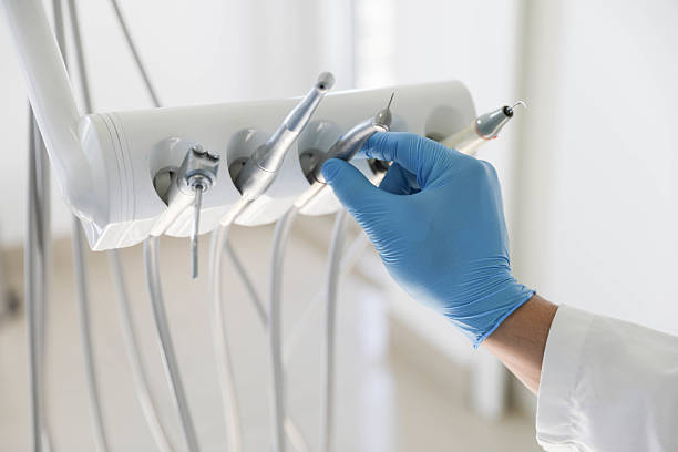 Professional Root Canal Treatment technician working in Calcasieu Parish County, LA